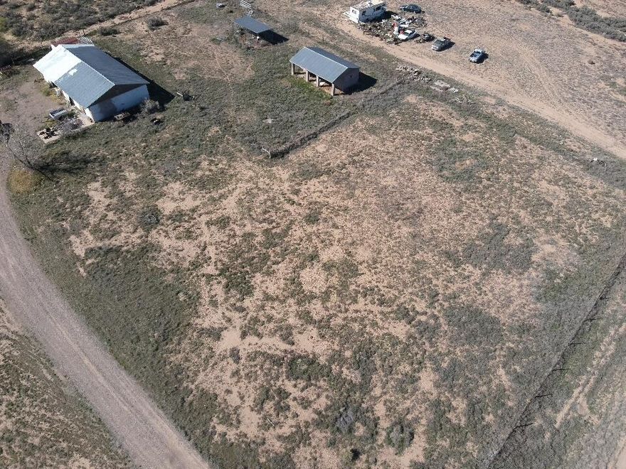 1.02 flat acres in Escalante Valley Ranchos, Beryl, UT. This lot is loaded with value! 5-bay shop w/ 500-amp power, 2-stall barn
and 1 acre-ft water rights. No HOA, no easements. Right off SR-18 with ample room at the front to build while preserving every
existing structure. Versatile, unrestricted, and ready to go!