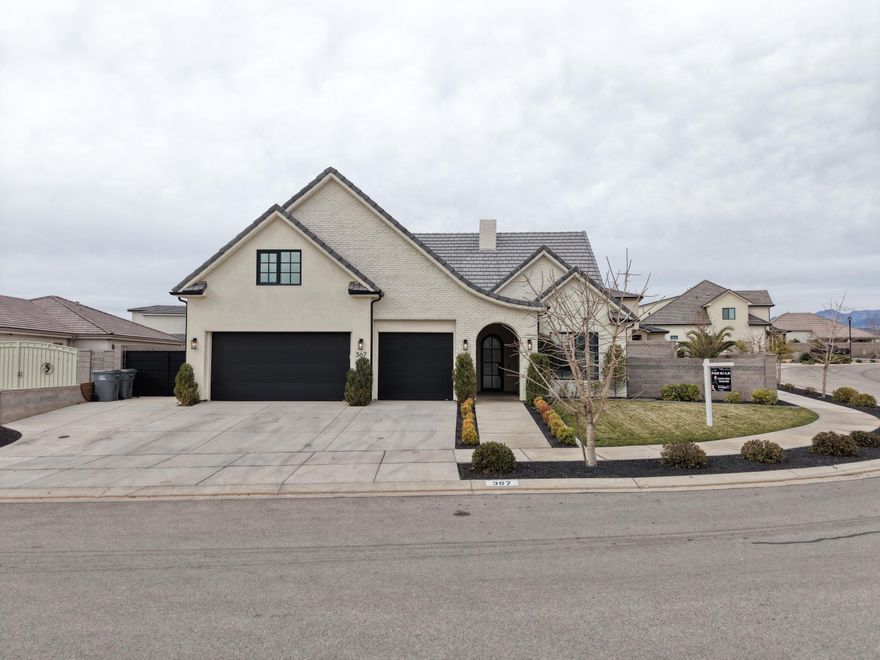 Beautiful home in the desirable Vineyard Ridge subdivision! This thoughtfully upgraded single-family residence offers 2,606 total square feet with 4 bedrooms, 3 bathrooms, and a flexible den/office space—perfect for working from home or additional living needs.

The heart of the home features a large, upgraded kitchen with quartz countertops, double ovens, and quality finishes throughout.  Abundant natural light, and a functional floor plan make this home both comfortable and practical for everyday living.

Step outside through a 12 ft accordion style glass door into a fully landscaped backyard oasis, complete with a pool and expansive lounging areas ideal for relaxing or entertaining under the Southern Utah sun. The property also includes RV parking, an attached 3-car garage, and sits on a low-maintenance 0.27-acre lot.

Located on the border of Santa Clara and St. George, this home offers peaceful surroundings while still being close to local amenities, trails, and scenic red rock views.