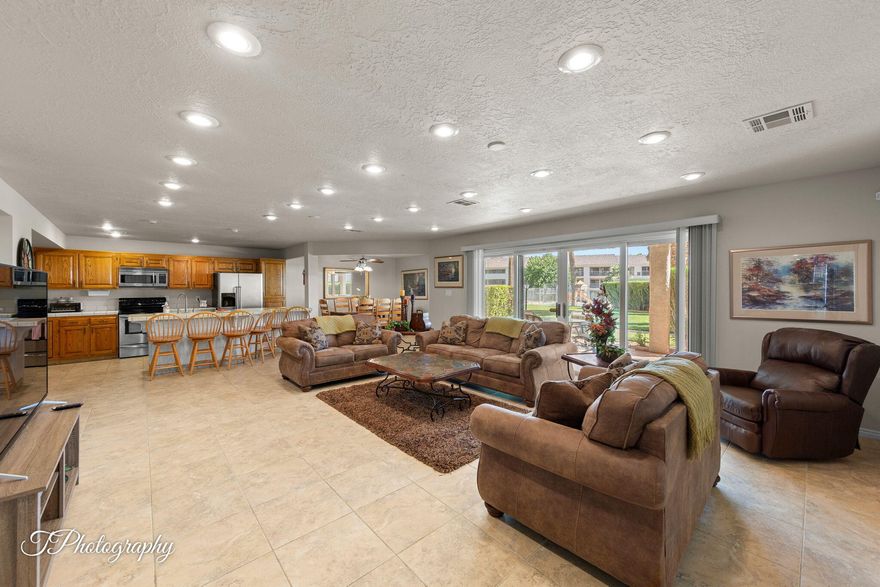 Motivated Seller! Turnkey Vacation Rental in Las Palmas! Fully furnished and short-term rental friendly, this main floor condo offers a smart, open layout with low-maintenance tile flooring, spacious rooms, stackable washer/dryer and brand new water heater. Relax on your covered private patio just steps from a nearby community pool. Detached garage. Taxed as a second home. Las Palmas delivers resort living with multiple pools & spas, pickleball courts, playgrounds, fitness center and more. All this in a prime location near shopping, restaurants, and miles of hiking & biking trails. Invest, vacation, or both...this one checks all the boxes!