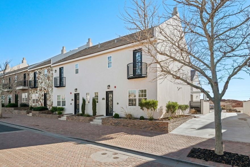 This turnkey vacation rental property is like new and is located just minutes from Sand Hollow Reservoir and Sand Dunes, with countless outdoor recreation opportunities nearby. Designed with high-end finishes throughout, this spacious home features two large gathering areas, four bedrooms -including a generous bunk room - and four bathrooms. The outdoor living space includes a private hot tub and is perfect for relaxing after a day of adventure.  Community amenities include: two resort-style swimming pools, splash pad, oversized hot tub, clubhouse, Pickleball courts, and parking for RV's, boats, and trailers.