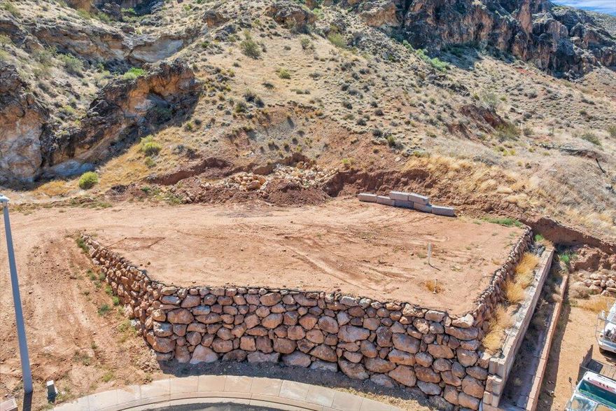 This 0.30-acre lot is part of four contiguous parcels, offering endless potential. It's the perfect place to build your dream home, surrounded by peaceful desert landscapes and breathtaking views. You also have the option to add an accessory dwelling unit (ADU) for additional living space or rental income. For builders and developers, these lots offer excellent investment potential and back up to an incredible ridgeline that enhances privacy and scenic value. With no HOA and the ability to bring your own builder, the possibilities are wide open. Located near Zion National Park, Sand Hollow, Warner Valley, sand dunes, and world-class outdoor recreation, this is a rare opportunity to create something truly special. Buyer/buyer agent is responsible for verifying all information.