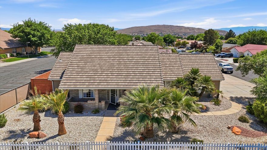 Turn-key and beautifully renovated, this corner-lot home offers a functional layout and a fully fenced yard in one of St. George's most convenient locations. Recent updates include new LVP and carpet flooring, refreshed cabinetry, quartz countertops, updated appliances, and modern fixtures throughout. The main living area features impressive 15-foot ceilings and opens to views of the private backyard, creating a bright and inviting space.
The primary suite includes a spacious walk-in closet and direct backyard access through French doors, adding comfort and privacy. Step outside to a large covered patio--perfect for relaxing or entertaining year-round. The extended driveway offers a substantial concrete parking area with room for an RV, boat, or multiple vehicles.
Situated in an established neighborhood near downtown St. George, this home provides quick access to everyday essentials including grocery stores, restaurants, and local shopping just minutes away. Medical facilities and schools are also nearby, making it a highly practical location for full-time living or investment. The property is located within the Chapel Lane area and is part of the Heritage Elementary, Dixie Middle, and Dixie High School boundaries. 
Outdoor recreation is right around the corner at Boots Cox Family Park, offering walking trails, pickleball courts, a playground, and mature shade trees. With NO HOA and a central location that balances convenience and lifestyle, this property is a standout opportunity in St. George.