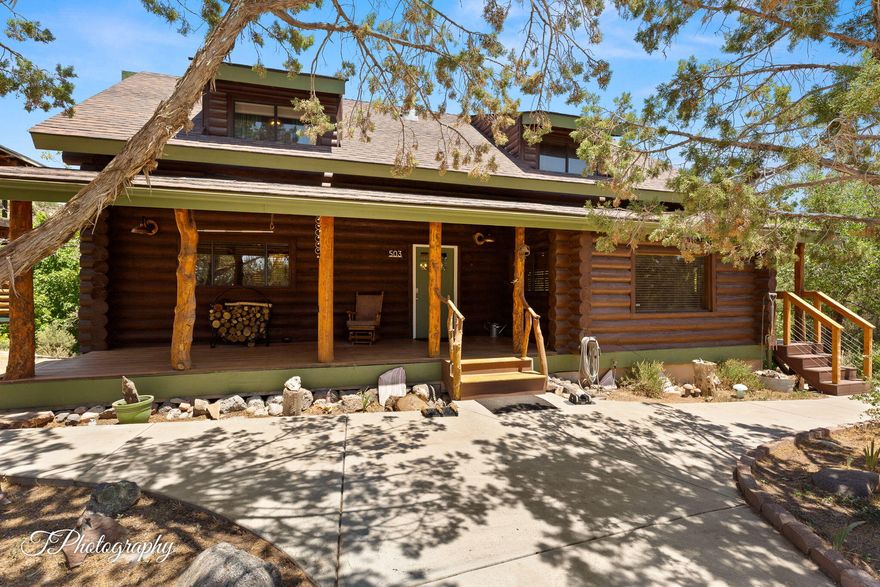 Enjoy year-round living in this updated Brookside cabin, tucked in the trees and backing to the Santa Clara River. Inside, you'll find a remodeled kitchen with new appliances and reverse osmosis, updated bathrooms, vinyl flooring throughout, PEX plumbing, fresh baseboards, live-edge wood shelving, and modern lighting. Take in the views from the refinished deck or the private balcony off the primary bedroom. Relax in the redwood barrel sauna in the evenings. Just steps from hiking and biking trails, this property is perfect for outdoor lovers. The detached 2-car garage includes an ADU (casita/apt) above, ideal for guests or as an income-producing rental. No HOA. Seller willing to contribute towards buyer closing costs with an accepted offer. Seller Financing Possible.