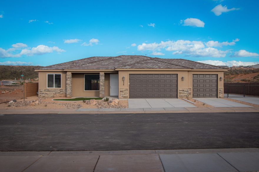 Gemstone Custom Homes has a special one here for someone with takes their hobbies seriously. With a three-car garage PLUS a 21' wide, gated RV pad with full hookups, and plenty of room for a future shed.  Drought resistant landscaping in both front and back with an automatic drip system, artificial turf and decorative rocks. Flooring in the main areas and bathrooms is durable wood-grain tile, classic-style hardwood cabinets with soft-close hinges and under cabinet lighting, 3 cm thick quartz countertops, walk-in tile shower is separate from the tub in the master bathroom, high quality Moen plumbing fixtures, GE appliances, covered patio in the back for afternoon shade, fully finished and painted garage and no HOA!