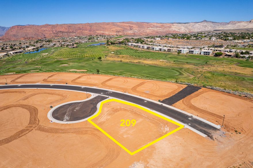 Prime .34- acre lot in the prestigious Yellow Knolls subdivision at the Ledges of St. George.  Enjoy stunning views of Snow Canyon, Fish Rock and the golf course. Perfect for a custom home surrounded by red rock beauty and outdoor adventure.