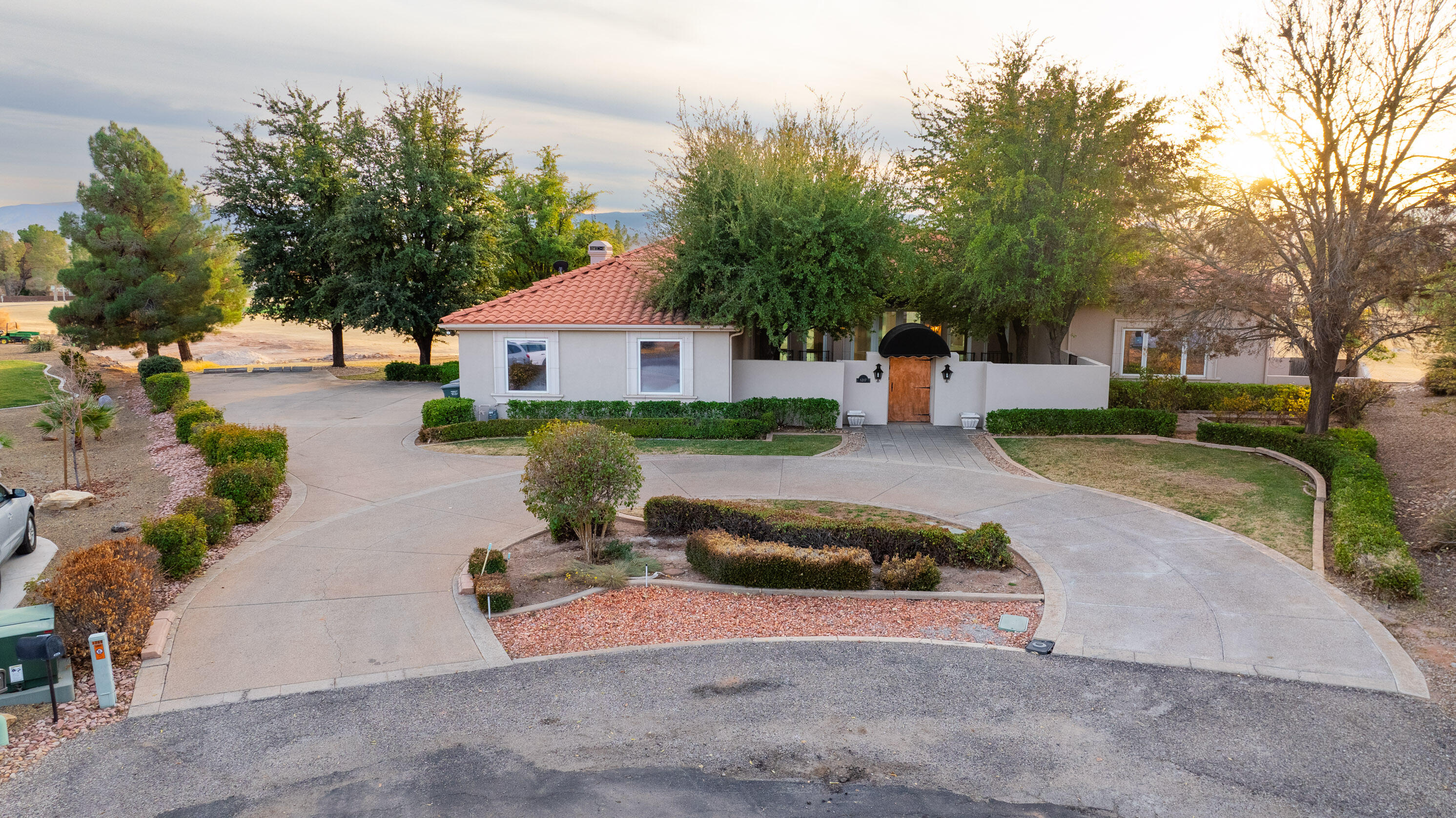 Welcome to your dream home, a stunning 5,176 sq. ft. oasis nestled on a picturesque golf course, built in 1994. This exquisite residence offers a tranquil courtyard adorned with a canopy of lush trees, providing a serene escape. When you first step into this home, you're immediately greeted by a spacious living area that exudes warmth and comfort with its inviting fireplace, perfect for cozy evenings with family and friends. Large windows line the walls, allowing natural light to flood the space while offering breathtaking views of the lush golf course beyond. The heart of this stunning home is the large chef's kitchen that combines functionality with elegance. With ample cupboard space, you'll never run out of room for all your culinary essentials, making meal preparation a joy rather than a chore. Adjacent to the kitchen, you'll find a formal dining room designed for entertaining where you can create unforgettable memories with loved ones. The inviting office is a book lover's paradise, with wall-to-ceiling wooden bookshelves perfect for showcasing your literary collection. The spacious primary suite features the luxury of his and hers bathrooms and a private patio, ensuring ultimate privacy and convenience. The expansive basement is a haven of comfort and functionality, boasting two additional bedrooms, two bathrooms, a versatile bonus room, and ample storage space. This exceptional property seamlessly blends elegance and functionality, promising an unparalleled living experience. All information deemed reliable, buyer to verify all.