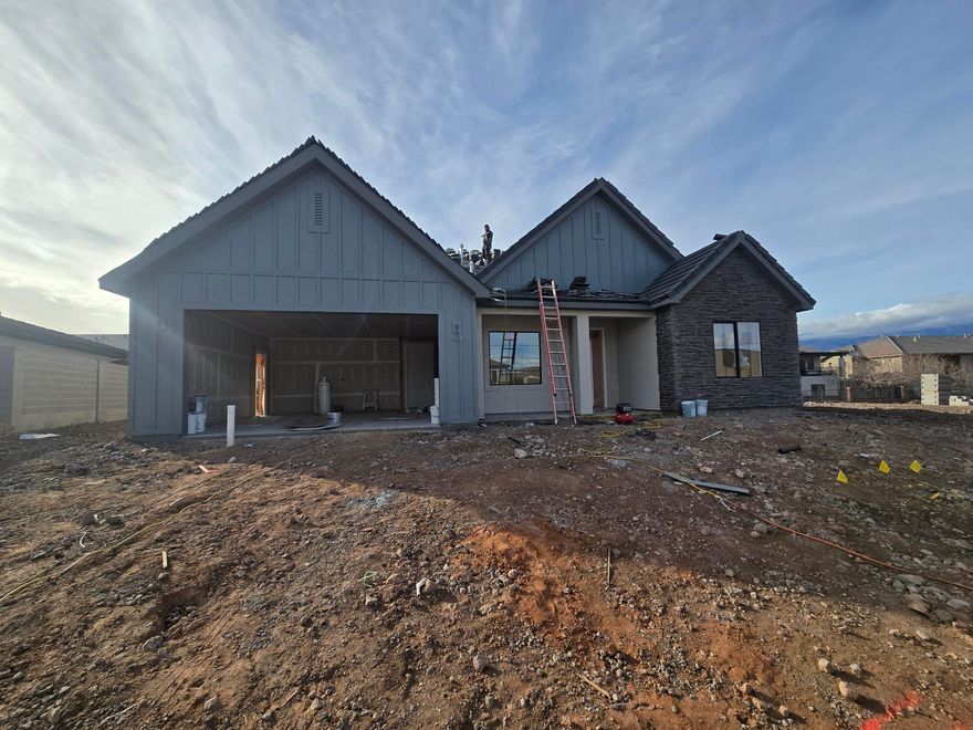 Discover your dream home at Fire Rock, a stunning new D.R Horton community in Hurricane, UT! Explore the ''Oakley'' floorplan in the Scandinavian style, 3 beds, 2.5 bath, plus an office and the best part? NO HOA. Open family/kitchen layout, 9' ceiling on main, standard kitchen layout, tray ceiling in family room & bedroom 1, 42'' upper cabinets w/ crown molding, upgraded cabinet features: soft-close, gas appliances, quartz countertop, laminate throughout the kitchen, dining and family, bedroom 1 suite, grand bath with garden tub, separate walk-in shower and 2nd vanity sink, 2 large other bedrooms. Estimated completion February. Ask me about our generous home warranty & Permanent Interest Rate Buy-Down. Improving quality of life here with its prime location, Fire Rock is truly a gem.