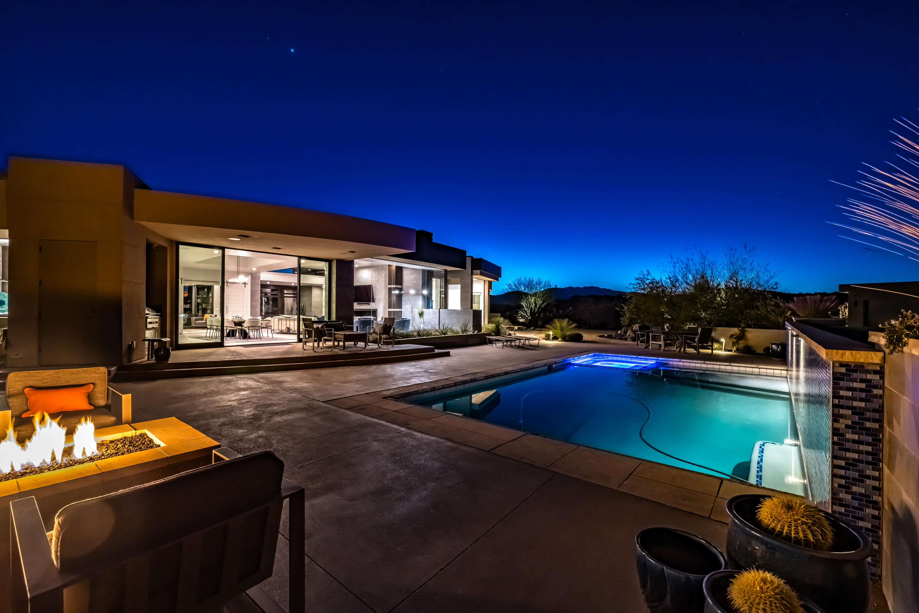 This gem is what you've been looking for! A true Entrada masterpiece, nestled in the desirable and prestigious lava rock of Chaco West at Entrada. This magnificent home sits on 1.15 acres on a quiet cul-de-sac street, boasting breathtaking views including Snow Canyon, Pine Valley Mountain and Red Mountain. Chef's kitchen complete with SubZero refrigerator/freezer, Wolf oven, Wolf steam oven, Wolf range top, 2 Miele dishwashers, beverage cooler and additional refrigerator/freezer in prep kitchen. Private Casita with beverage cooler and full size washer/dryer. Smart home features include Lutron lighting, Lutron shades, nest thermostats, security system with cameras, Sonos (inside and outside).  ***Furniture Package, Full Equity Golf Membership, Golf Cart, TV's & Electronics Included*** Skylights and clerestory windows throughout fill this home with natural light. Custom salt water swimming pool with spa, water features, and retractable cover; additional space for putting range at back of property if one desires. 4 car garage (separate garage entrance for golf cart) includes built in storage for all of your toys and golf clubs; equipped with plug-in for an electric car. Custom chandeliers by Hammerton studio....no upgrade was overlooked in this home. Designed by Rob McQuay and built by Shakespeare Development - this home is sure to impress!