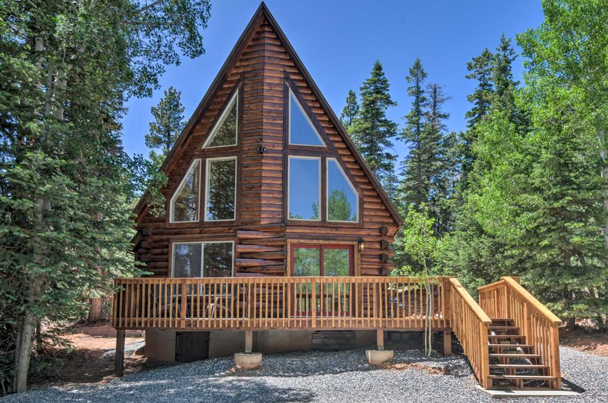 Great Opportunity to own a Turnkey Cabin In Duck Creek. Built with D logs has a prowl front and sits back among tall pine and aspen trees, for privacy. Large .52 acre lot. Home boasts many upgrades including new counter tops and appliances, new floors, new pellet stove, all new furniture, and landscaping. Large fire pit. Storage in the crawl space under the home. Cabin is currently used as a vacation rental.