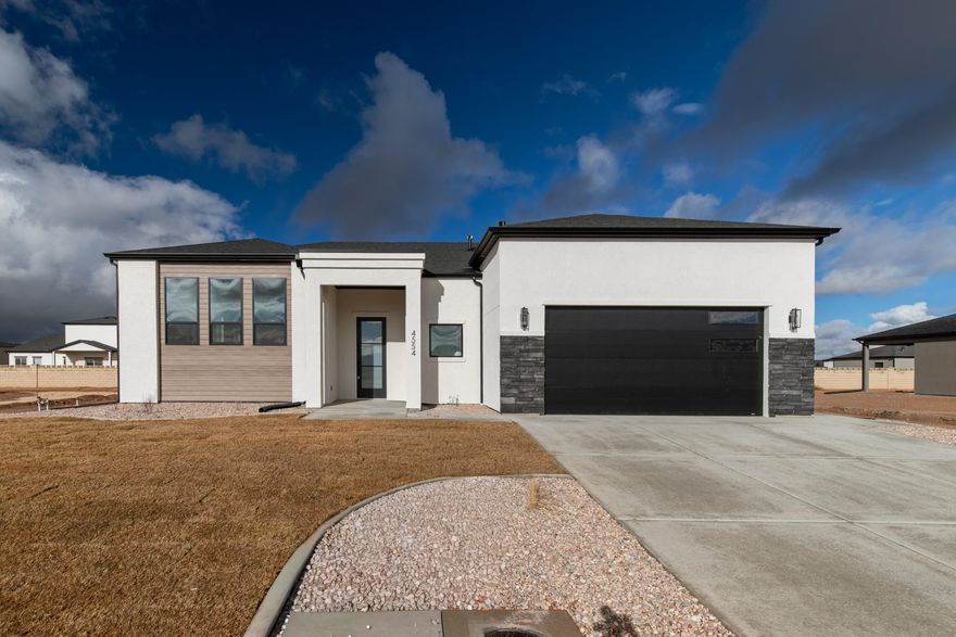 Expected Completion: January 2026
Introducing The Breeze — the most popular floor plan in the Iron West community! This modern take on the split-level design offers bright, open living with abundant natural light, a vented kitchen hood, and a covered back deck on a spacious lot. Upstairs features two bedrooms, one-and-a-half baths, and a large primary walk-in closet. The basement includes two finished bedrooms, a full bath, and one unfinished room ready for your personal touch. A perfect blend of comfort, style, and functionality — built by Alex Meisner Construction!