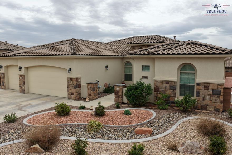 One of a kind in The Reserve at Green Springs. One level. No stairs. Open floor plan. Large corner lot with amazing views of the sunset.  Many fruit trees.  Large covered patio spanning the length of the home. South-facing. Newly steam-cleaned carpets and tile floor, and new sealant.
Instant hot water.
Water softener.
220V AC for EV charging.
Jacuzzi with power jets in the primary bathroom.
Ceiling-mounted storage racks in the garage.
110V AC in the garage for refrigerator or freezer.
Casita with a separate entrance.
Independent Mitsubishi climate control mini split.  Casita has a microwave, sink, disposal, and mini fridge. Located within minutes of Cosco, Walmart, Home Depot, movie theaters, and the Green Springs Golf Course. Many amazing sites are close by. The Dinosaur Discovery Museum and the Washington Community Center are all within 10 min. the Tuachan Amphitheatre, Sand Hollow Reservoir, and Zions Nat. Park are all close by and easy to enjoy.  The main Regional Hospital Complex is within a 25-minute drive.