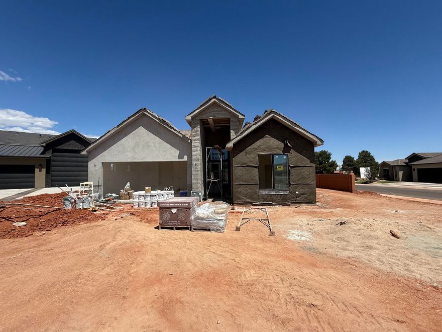 New neighborhood right off Main St. in Ivins! Located in the heart of Ivins, Serenity Estates is a desirable, serene neighborhood.  This home has a beautiful Red Mountain View from the large backyard. It is located on the corner of a quiet cul-de-sac, and has an open floor plan and plenty of windows! Upgrades include painted cabinets, quartz countertops,  speakers in the great room for surround sound,  and an epoxy garage floor.  Close to trails, Tuacahn Amphitheatre, Snow Canyon, and Gunlock Reservoir.