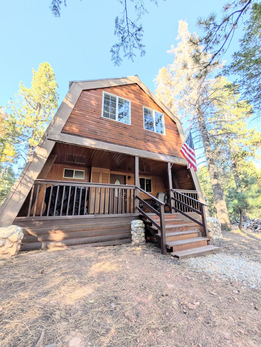 Fully remodeled and freshly stained cabin in Meadow View Estates, operating as an active, income-producing short-term rental. An expansive great room showcases striking tongue-and-groove ceilings and a beautiful fireplace, flowing to a modern kitchen with granite counter-tops and new stainless steel appliances. The flexible layout offers two bedrooms plus an upper loft, with an upgraded bathroom on each level for convenience. Positioned moments from Duck Creek Village amenities—including restaurants, side-by-side and snowmobile rentals—with direct access to off-road trails, hiking, and nearby Navajo Lake for fishing and water sports. Brian Head, Bryce Canyon and Zion National Park are both within approximately one hour. Set on nearly three-quarters of an acre of flat land with two drivew Set on nearly three-quarters of an acre of flat land with two driveways, this property provides ample parking, including RV parking. Vacation rentals are permitted. All furniture and appliances convey. A turnkey mountain retreat and compelling investmentready now.