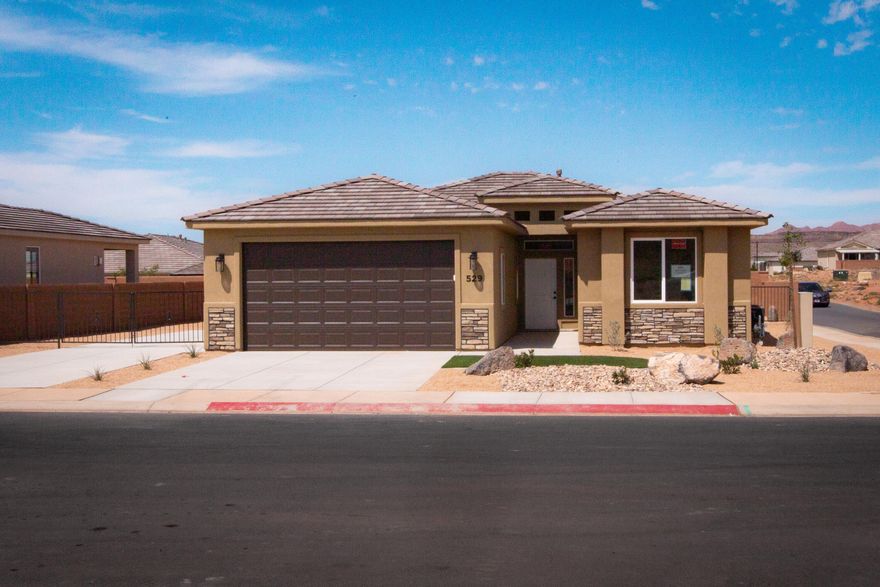 Gemstone Custom Homes - Recently finished and move-in ready! No HOA. Some photos are of a previously built home (same floor plan). This home features drought-tolerant professionally landscaped front and backyard with a covered patio. Master suite includes spacious walk-in closet and fully-tiled recessed walk-in shower with glass door. Two car garage is fully drywalled and painted! Quality GE appliances, stainless sink in the kitchen island, Moen Plumbing fixtures, quartz countertops, spacious pantry, and classic stained hardwood cabinetry with soft-close hinges and under-cabinet lights. Woodgrain tile floors and gas fireplace in living room. Thirty-foot paved RV pad with full-hookups! (water, 30-amp + sewer dump).