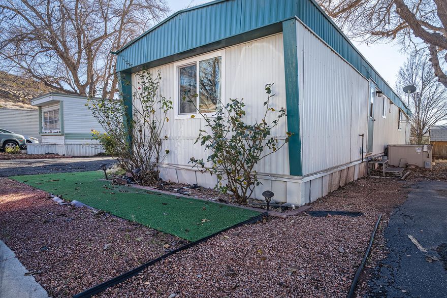 Looking for easy, affordable living in Washington? This updated 3-bedroom, 2-bath home in a welcoming 55+ community in Pleasant View Mobile Homes might be the perfect fit. Recently refreshed with a fully remodeled kitchen, new cabinetry, sleek countertops, updated flooring, and energy-efficient windows, this home is bright, comfortable, and move-in ready.

Enjoy your morning coffee on the covered front deck, and if you have pets, you'll love that the home backs directly to the community dog park. Plus, you're just minutes from the dining, shopping, and outdoor recreation of nearby St. George.

Affordable, low-maintenance, and ready for its next owner -- come see why this could be the perfect place to call home.