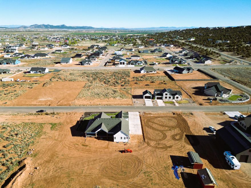 Build your dream home on this spacious .88-acre lot in 4B Ranch! You'll love the open setting, beautiful views, and the freedom of country-style living with city convenience. This property offers animal rights, bring-your-own-builder flexibility, and valuable prep work already completed, including a survey and site plan available upon request. Utilities are available, making this an excellent opportunity to move forward with your custom home plans in one of Cedar City's desirable large-lot subdivisions less than ten minutes from all that Cedar City has to offer.