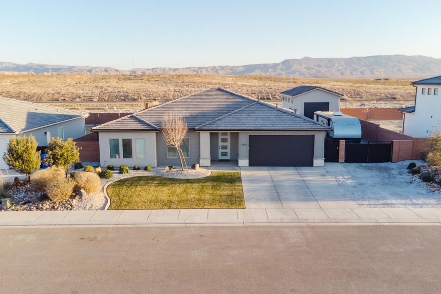Beautiful home located in the desirable Sage Canyons subdivision! This 2145 sq. ft. home features an open floorplan. 4 bedroom and 2 bath. An extended covered patio with a large back yard and side yard. 

The home also features a an amazing 30' x' 18' detached RV garage! Perfect for a trailer/RV, additional storage, gym or office area. Garage is well insulated and temperature controlled! Must see!