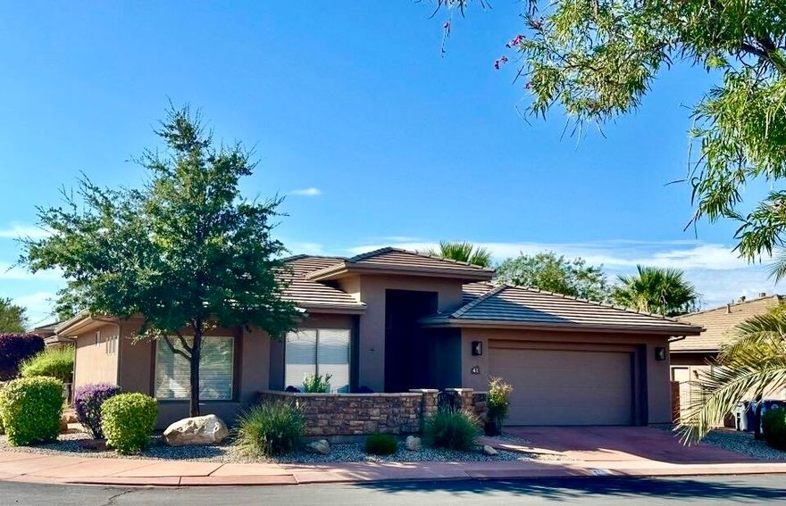 This home has been updated in beautiful neutrals complimented with bright natural sunshine. This well-maintained 3-bed, 2-bath home is 1474 sq ft of cozy & comfortable living. The open floor plan connects the living, dining, and kitchen areas for entertaining or quiet time. Glass doors open to a spacious, tastefully landscaped green grassed yard year round, with large beautiful mature palm tree's. This home has been designed to be a perfect escape or your own Home Sweet Home.  River Crest is centrally located just minuted from bike & walking paths, golf, Sand Hollow , Snow Canyon & Tuachan. Needless to say there are endless opportunities to play or relax. The home is just minutes from shopping, dining, entertainment, and community amenities, offering comfort, location & lifestyle. River Crest Residents enjoy access to their beautiful pool and hot tub. There is nothing better than ending a full day relaxing on your own front patio with your favorite beverage soaking up the beautiful sunsets in #41. It's more than a house, it's a home made for making memories.