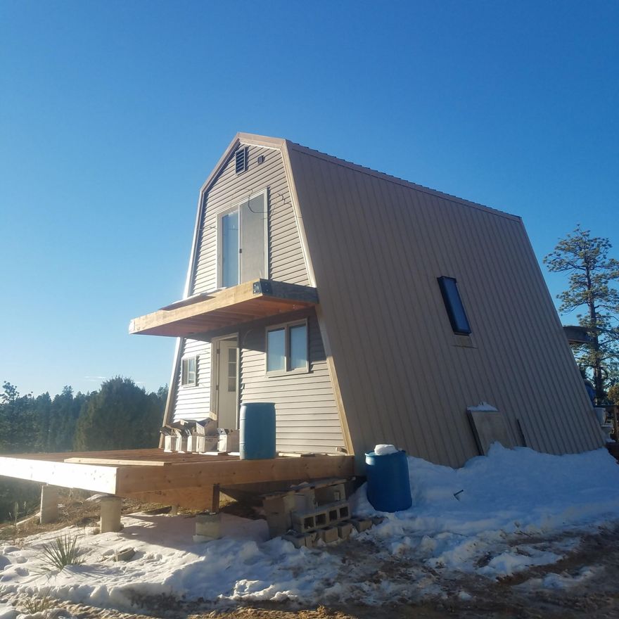 Escape to the Heart of Southern Utah — Your Private Cabin Retreat Awaits!!  POSSIBLE SELLER FINANCE!!

Nestled on 2.66 pristine acres in the quiet wilderness of Orderville, this charming 2-bedroom, 1.5-bathroom cabin offers the perfect blend of rustic character and modern comfort. Whether you're looking for a peaceful getaway, a vacation rental investment, or a year-round residence immersed in nature, 11685 W Fir Road delivers the lifestyle you've been dreaming of.

This is an investors dream or any handyman!  Cabin is NOT completed yet. Includes 2 sheds and one older trailer on the property.

Imagine sipping coffee on your front porch with deer wandering by, or stargazing under pitch-black skies unmarred by city lights. AWESOME!