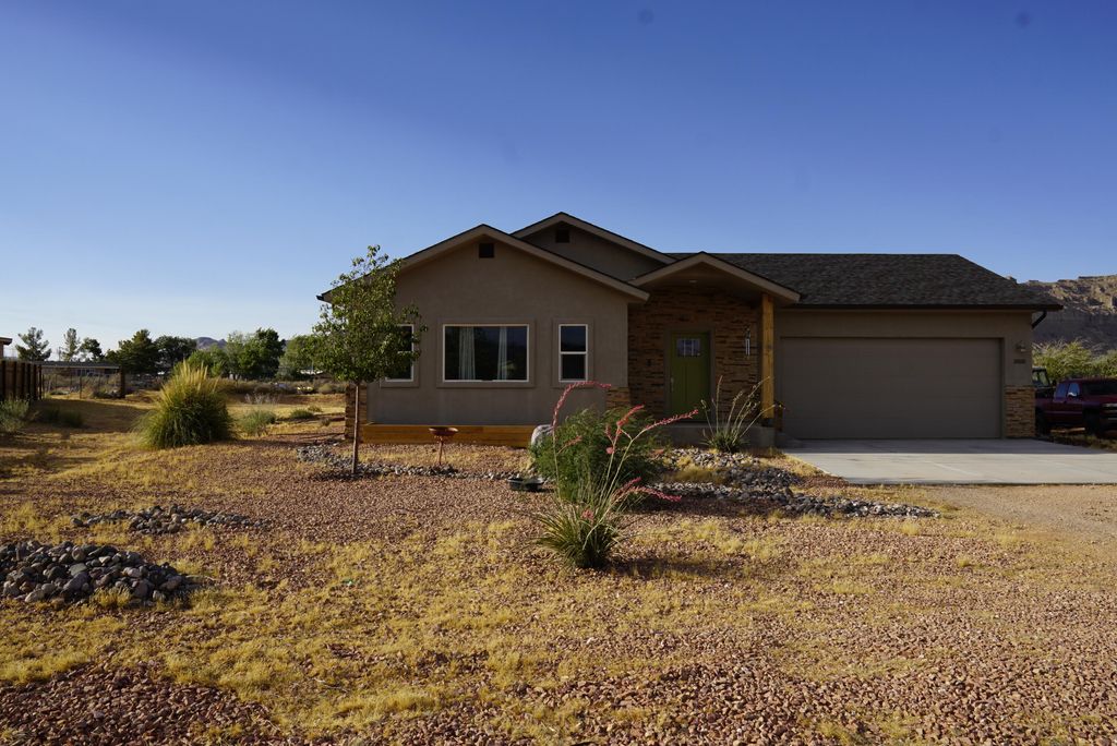 Photo of 1000 E Canyon DR, Big Water, UT 84741 (MLS # 26-273626)