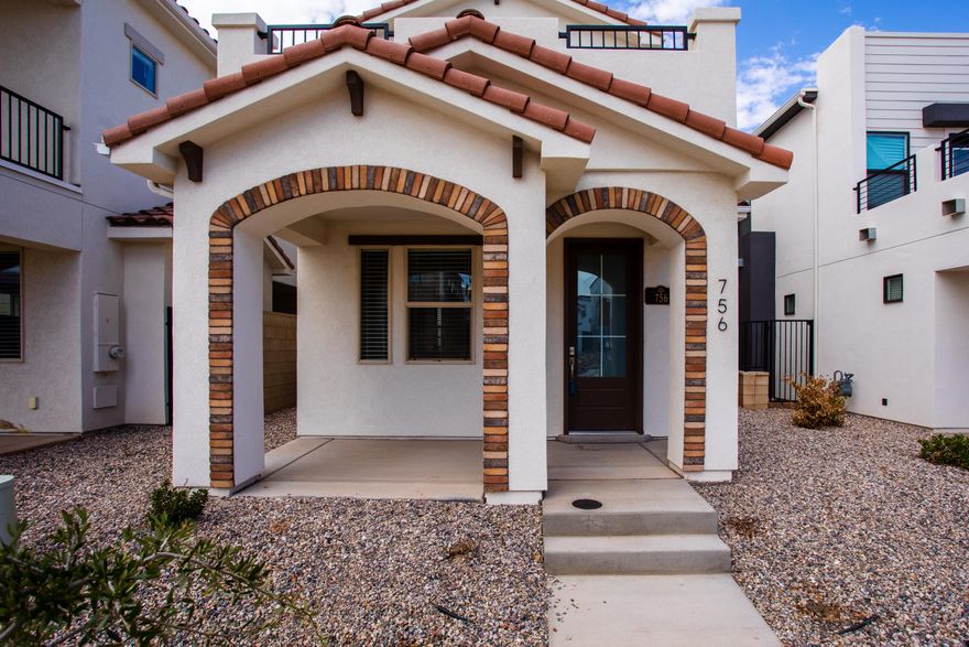 Owner Agent DESERT COLOR! Darling Spanish mission style home with Master bedroom private balcony!! wood floors through out except for bedrooms. Enjoy walking distance to all the amenities, enjoy the lagoon, pool, all the little parks, common area's & walking path's. This is a fun active community. PLEASE CALL AGENT FOR APPT.