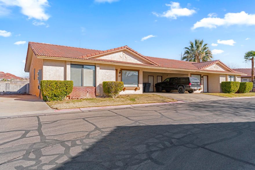 Beautiful Southern Utah Views + Affordability with this well-maintained 3-bedroom, 2-bath, 1039 SQ. FT. townhouse. Tucked away in a quiet St. George neighborhood. Enjoy private mountain views from the backyard patio while backing up to a church parking lot for added privacy and no neighbors behind! Features include a carport with storage closet, fresh paint, clean carpet, new toilets, and a new refrigerator. Low HOA provides a pool and well-kept common areas. Perfect for a first home, vacation property, investment, or anyone seeking affordability in Southern Utah. Conveniently located near stores, parks, trails, Snow Canyon, and all the amenities St. George has to offer. Listed under $300,000 at $298,000 you are going to want to see this one!