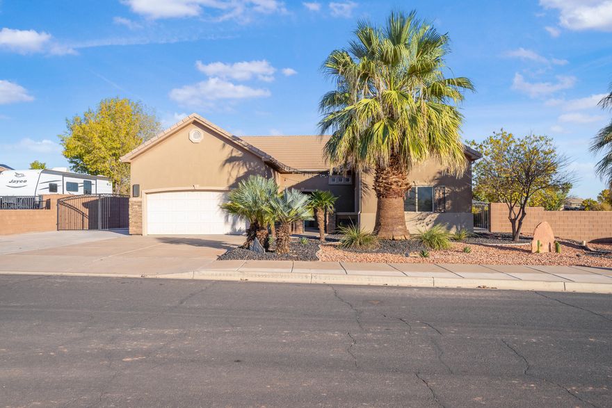 Looking for a move-in ready home with an amazing back yard, you have to see to believe? Look no further, this move in ready Ivins home is it! Updated kitchen and bathrooms. New LVP and tile flooring on the main level. Fresh paint throughout. 5 bedrooms, 3 bathrooms, a main level living room and a bonus room upstairs that could be used for a family/game room or office. So many upgrades, including Enphase solar panels with back-up battery. Backyard offers over 2,500 square feet of paver hardscape and an Outdoor kitchen which boasts Blaze 40'' gas grill, 30'' gas griddle, gas power burner and fridge, 540 sq ft awning with custom metal roof and fireplace chimney wrap around/ pop through, plus gazebo for additional seating. Epoxy garage floor. RV parking and much more!