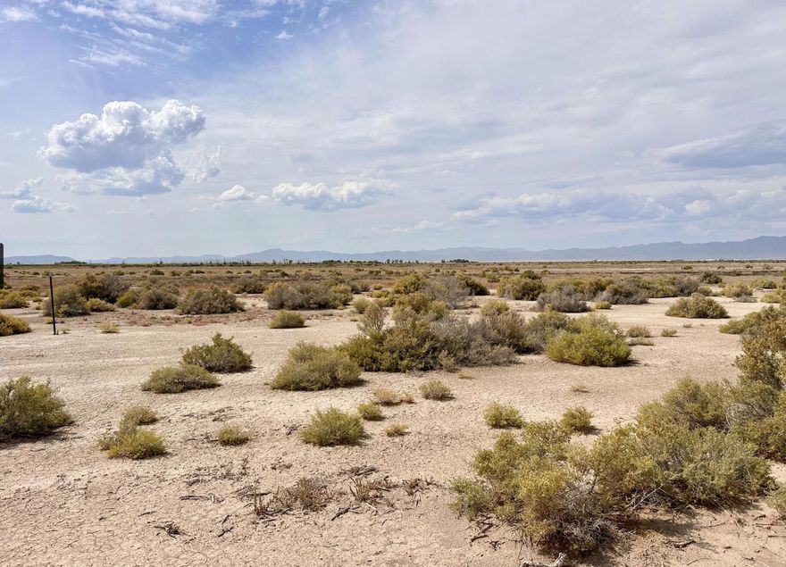 40 acres of dirt bike paradise. On very nice county maintained road with power right across the street a short distance from the main highway. Views in every direction and fence on the North end of the property. Water rights available for sale separately.