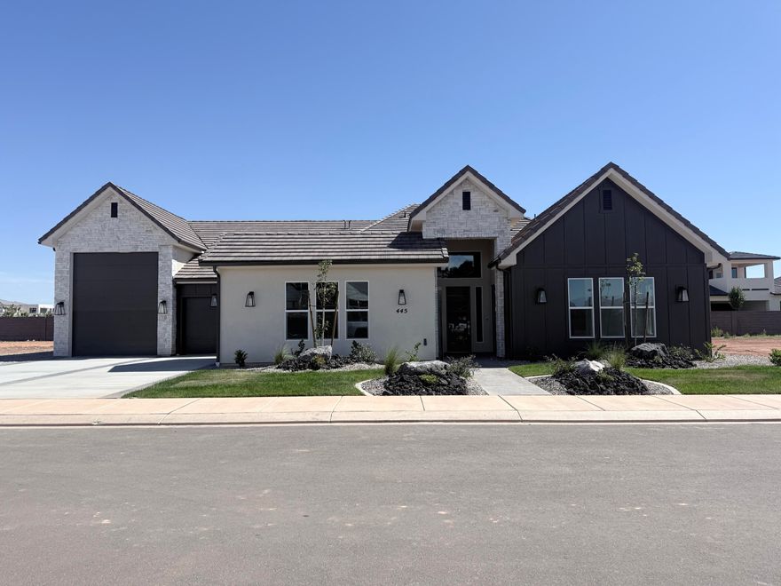 This beautiful home is situated on the east side of town and boasts features such as LVP flooring, quartz countertops, and under-mount sinks with soft-close drawers and cabinets. It  includes a smart home kit, a Wi-Fi router, a programmable thermostat, and a keyless front door lock. The garage features an epoxy-coated floor and accommodates a 41-foot RV garage. Additionally, there is a 15-foot side parking space and a 30-foot backyard. The home is also plumbed for a future pool.