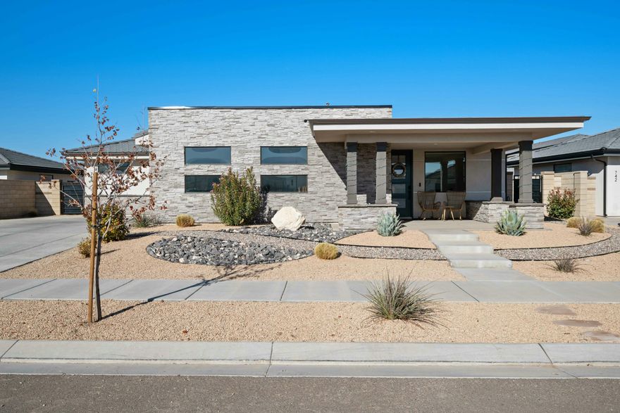 748 W Rust Bluff Drive, St George, UT 84790
MLS #24-256634

Discover your dream home in the heart of Saint George's vibrant Desert Color community! This stunning 3-bedroom + Office that could be a 4th bedroom , 2.5-bathroom home offers modern design and effortless luxury. The open-concept floor plan features a spacious living area, a sleek kitchen with quartz countertops, stainless steel appliances, and an oversized island perfect for entertaining. The primary suite boasts a spa-like bathroom with dual vanities, a walk-in shower, and a generous closet. Outside, enjoy breathtaking desert views from your private patio. The 3-car garage provides ample storage for all your needs. Located in the amenity-rich Desert Color neighborhood, you'll have access to a lagoon, walking trails, parks, and more.