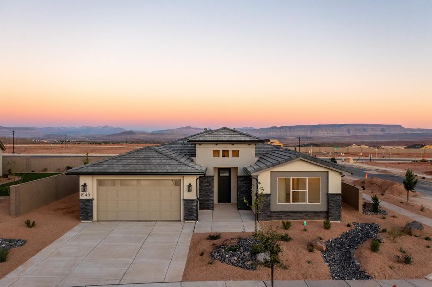 Welcome to the Mesa, a stunning 4-bedroom, 3-bathroom home that spans 2,350 square feet of beautifully designed living space. This floorplan features a spacious kitchen with optional gourmet enhancements, perfect for your culinary endeavors. A large, three-panel multi-slide door can be added, extending your entertaining area right off the main living room and seamlessly blending indoor and outdoor spaces. The primary suite includes a luxurious ensuite bathroom, adding to the home's allure. With a convenient 2-car garage and access to the vibrant SOLIS community's resort-style amenities, including a pool, spa, and recreational courts, you can enjoy an active and fulfilling lifestyle in this remarkable home.