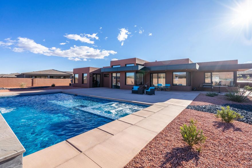 CUSTOM BUILT 3092 SF 3 BEDROOM, 3 BATH HOME WITH ONE BEDROOM BEING A CASITA WITH INSIDE & OUTSIDE ENTRANCE, INCLUDING A SECOND KITCHEN.  SEPARATE OFFICE AND 415 SF. GAME ROOM.  INDIVIDUAL HVAC ZONED HEATING & COOLING.  INCLUDES SOLAR PANELS & BATTERY PACK IN GARAGE FOR INEXPENSIVE ELECTRICITY.  BRAND NEW GUNITE POOL WITH SPA , VIEWS & COOL DECK.  HOME LOCATED IN INDIGO TRAILS ON .44 ACRE LOT.