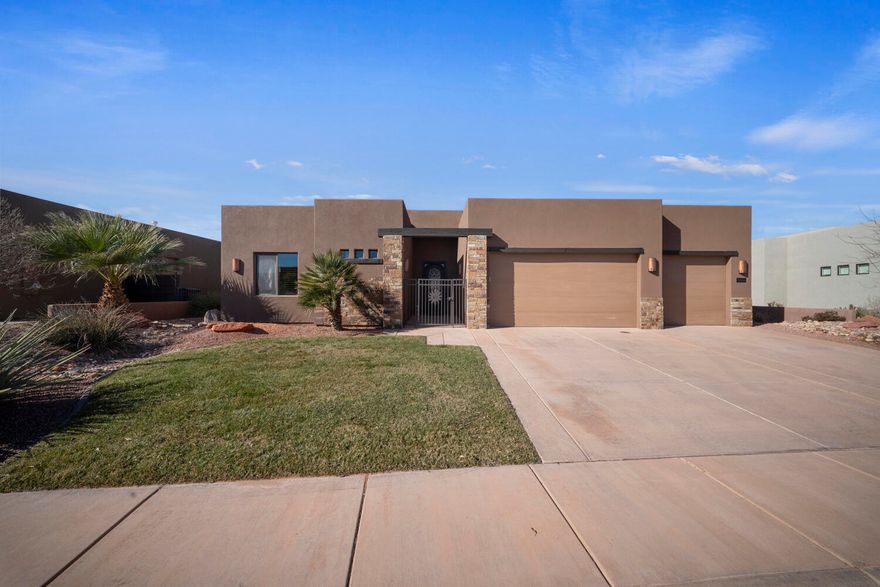 This 2,303 sq ft, fully furnished, turn-key home is located in Sand Hollow Resort, just minutes from Sand Hollow Reservoir and championship golf course. Featuring 3 bed/ 3.5 baths, each bedroom includes a private ensuite, offering exceptional comfort and privacy. The open floor plan showcases extra-high ceilings, tall wood doors, custom shutters, and travertine tile throughout.

Situated on a quiet street with no through traffic, the home offers a spacious, mature backyard, three-car garage, and sits on a 0.19-acre lot. The recently painted & stuccoed exterior enhances curb appeal, while resort ownership benefits complete this exceptional Southern Utah retreat.