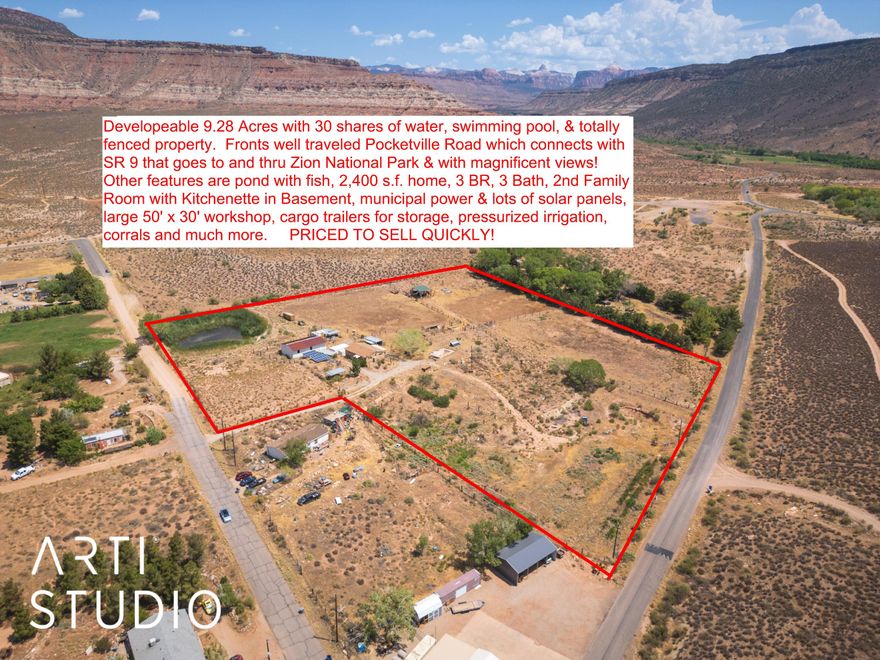 Listed at $41,000 below new appraisal dated 05/08/2025 by Blake Appraisal.    PRICED FOR QUICK SALE!   9.28 acres of prime road frontage, developable property, with pond and 30 shares of water rights, and on the way to Zion National Park. Other features include a pool, HUGE machine shop, your own fueling station (with 100's GALLONS still in the tanks), a green house, solar panels, and a walk in cooler, and much more! Home needs some updating. 1200 s.f. up and 1200 s.f. down with mother in law area, in basement - kitchen, bath, etc, with outside entrance. Everything stays, tools and all. Buyer is buying property and appurtenances AS IS. Property is totally fenced and has out bldgs for animals. Enjoy fishing in your own pond and catch bass & blue gill. What more can you ask for.