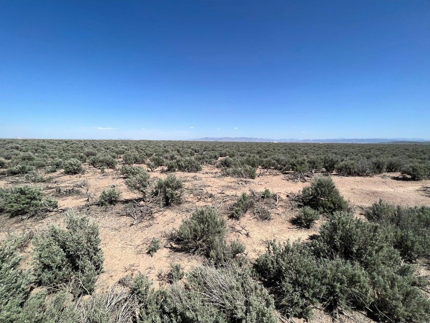 Address on listing is the nearest cross streets. This is 20 acres with no CCR's or HOA's. Bring your toys and animals; camp out or build your dream home and have a mini ranch. The possibilities are endless. Utilities not available.