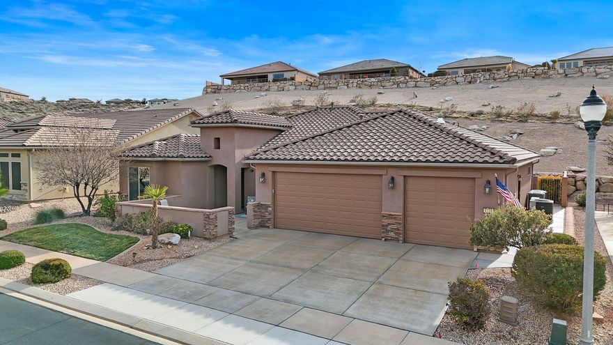 Welcome to SunRiver luxury living! This bright and airy home features a spacious front courtyard, an open-concept living area, built-ins, and a dedicated office. The kitchen features granite countertops and stainless steel appliances. Washer and dryer are included. The primary suite includes a walk-in shower and a generous walk-in closet. There is a large climate-controlled 4-car garage with a separate storage room and its own mini-split. Enjoy modern comforts, including top-down/bottom-up blinds and remote-controlled electric shades. The backyard opens to a common area, creating a sense of openness, privacy, and spaciousness. Perfect for relaxed desert living.