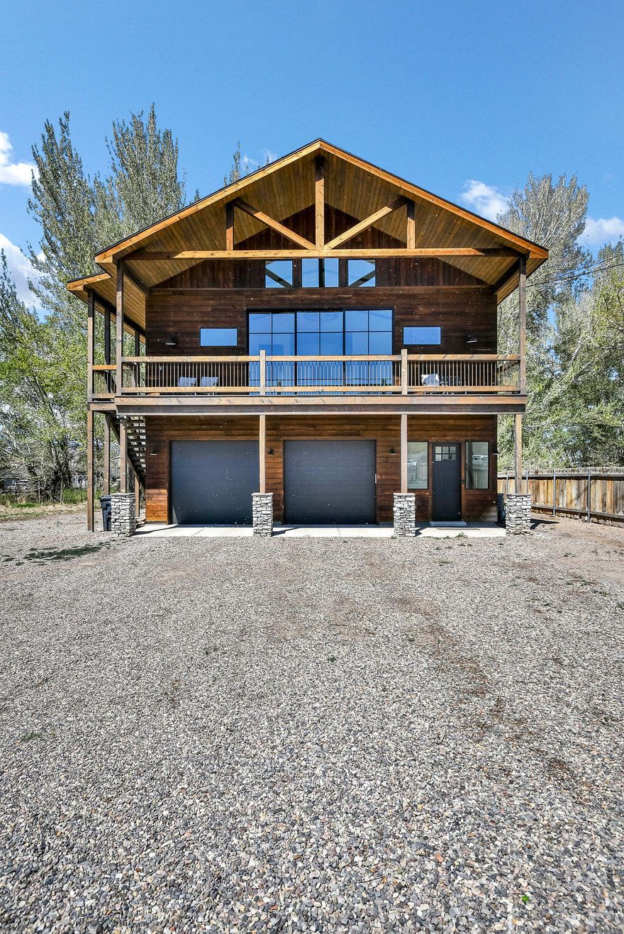 Tucked away at the end of the street in the peaceful setting of Annabella, UT this stunning 2 bedroom, 2 bathroom retreat offers the perfect blend of luxury, privacy, and strong investment potential. Situated on 1.37 acres with valuable irrigation water and livestock rights, this property is ideal for those looking to generate income now while building their long-term vision. Step inside the 1,771Sq. Ft home and experience an open-concept design filled with high-end finishes and natural light. The kitchen features beautiful granite countertops, while the living room is anchored by a striking gas log fireplace with floor-to-ceiling stone creating a true statement piece and warm, inviting atmosphere. The primary bedroom offers its own cozy electric fireplace, adding an extra layer of comfort and luxury. Every room is designed to maximize the setting, featuring oversized sliding glass doors that open to private balconies surrounded by quaking aspen trees, providing a peaceful, secluded feel. Enjoy three spacious decks, wired for a hot tub, and unwind in your private sauna for the ultimate relaxation experience. The property also includes an oversized garage and dedicated RV parking with power hookups. Currently operating as a successful nightly rental, this home is a proven income-producing asset with even greater upside. With ample acreage and layout potential, there is room to expand the existing structure making it an exceptional opportunity to create a larger estate or luxury retreat. Whether you're seeking a high-performing investment, a private getaway, or a property with room to grow into a custom estate, this one offers versatility, privacy, and long-term value. Located just minutes from scenic mountain trails, this property provides easy access to hiking, ATV riding, and endless outdoor adventure-making it just as appealing for personal enjoyment as it is for guests and renters.