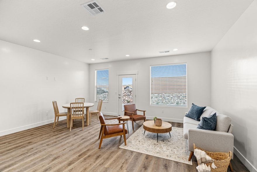 Modern 4-bedroom, 2.5-bath home with a 3-car garage in the brand-new Southern View community! Features include EVP flooring in the kitchen, dining, entry, gathering room, and bathrooms, upgraded carpet in bedrooms, quartz countertops throughout, stainless steel gas appliances, a stylish kitchen backsplash, and painted cabinets. Enjoy a large concrete patio and nearby community amenities. Ask about available lender incentives! Buyer and agent to verify all information. NOTE: Interior and exterior finishes are predetermined and may change. Photos are examples of the finishes are also subject to change.