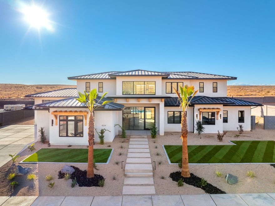 Paradise at Southern Shores. This recently finished home sits next to the Surf lake at Southern Shores. You'll have full access to the surf lake for on demand surfing, paddle boarding and swimming at the beach access as well as full access to the Cable lake. The Custom home features high end finishes, modern design, pool & spa,  open floor plan and breath taking views, all for a fraction of the price of the on lake lots.