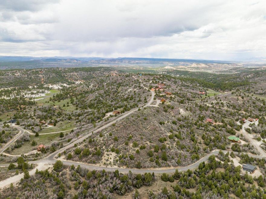 Nestled in the stunning mountains of Southern Utah, this spacious lot offers breathtaking panoramic views that are truly one-of-a-kind. Imagine waking up each day surrounded by the natural wonders of Zion National Park, Bryce Canyon, Lake Powell, the North Rim of the Grand Canyon, and Cedar Breaks—just to name a few. This is your gateway to some of the most iconic landscapes in the West. Set on a generously sized parcel, you'll enjoy the peace, privacy, and room to build your dream getaway, second home, or investment property. With water, power, and phone lines conveniently located at the road, you're just steps away from making your vision a reality. Year-round access is a breeze thanks to chip-sealed roads throughout the subdivisionkeeping mud and dust to a minimum no matter the season. Whether you're seeking adventure, serenity, or a little bit of both, this lot delivers. Don't miss the chance to own a slice of paradise in one of Utah's most desirable scenic corridors!