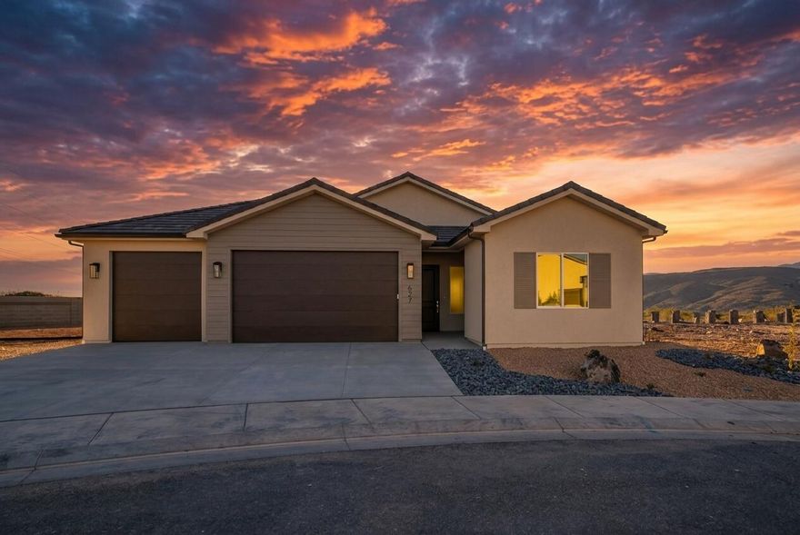 This well-designed home sits on a large lot in an exceptional community and offers impressive views from expansive windows. Highlights include a 26' third-car garage, 12' vaulted ceilings, and an oversized kitchen island perfect for gathering and entertaining. Finishes include 8' interior doors, quartz countertops, luxury vinyl plank flooring, and a spacious primary bathroom with a fully tiled walk-in shower. Ample space for RV parking and outdoor living makes this home a great fit for a variety of lifestyles. Don't miss this opportunity. Please note: This home is currently vacant. Select photos have been virtually staged to show furniture scale and layout possibilities.