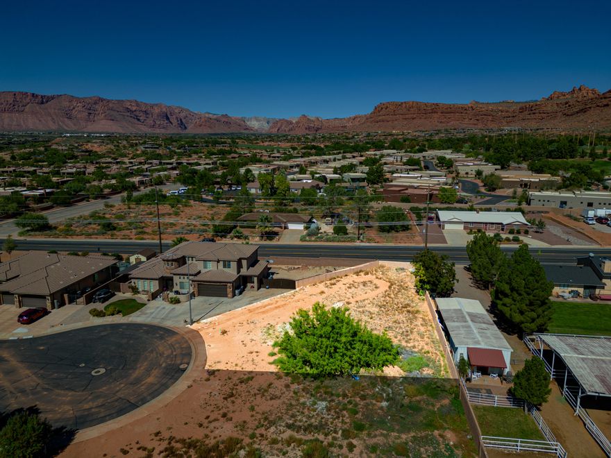 No HOA! Don't miss this incredible opportunity to own a large, build-ready lot in one of the most desirable areas of Southern Utah! Perfect for builders or buyers looking to design their dream custom home in a stunning established neighborhood.
Located in a highly sought-after cul-de-sac just south of Entrada.
Incredible views of Snow Canyon and the surrounding red rock landscape. Close to shopping, entertainment, bike and walking paths. We have home plans available and you can use our builder or yours. Adjoining lot available for purchase. Call to get started on your dream today!