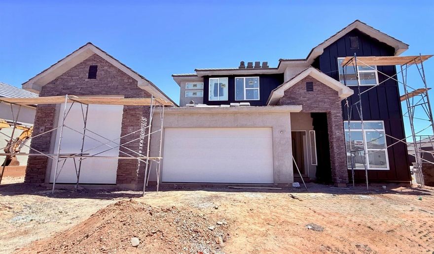 S&S Homes at Riverbend! Beautiful finishes thourghout, boat garage, front and backyard landscaping included.