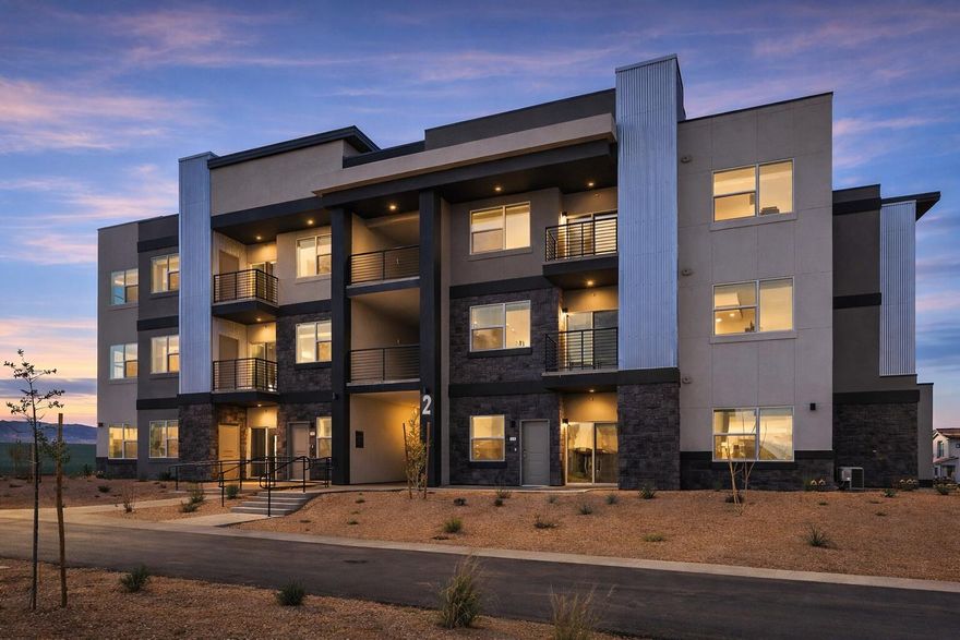 Experience refined, effortless living in this like-new ground-level residence in the highly coveted Desert Color community. Thoughtfully designed with a bright, open-concept layout, this home is filled with natural light from expansive windows, creating an airy and inviting atmosphere. Elevated finishes include white quartz countertops, sleek shaker cabinetry, and stainless steel appliances, blending timeless style with modern functionality. Smart home features and custom window coverings enhance both comfort and convenience. Enjoy true lock-and-leave living with no exterior maintenance, plus the added benefit of a private single-car garage. Move-in ready and impeccably maintained, this is an exceptional opportunity to own in one of Southern Utah's premier resort-style communities.