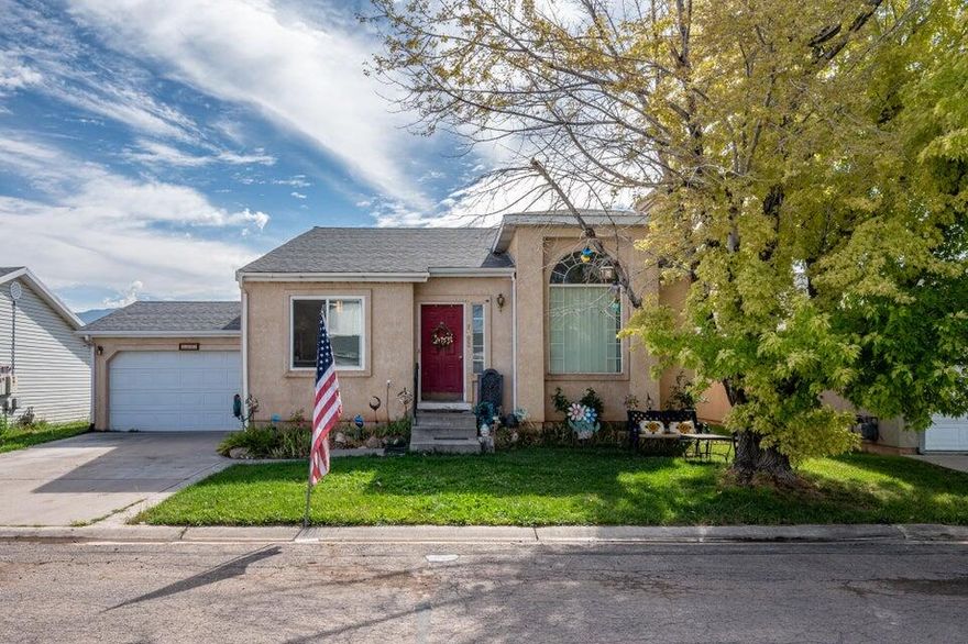 This 4 bedroom, 2 bathroom home offers a fantastic opportunity for buyers looking to add their own personal touch. Located in a central area close to schools, the hospital, parks, and walking trails, the convenience is hard to beat. The home features an open living area with vaulted ceilings in the living room, providing great natural light and a spacious feel. While some updates are needed, the layout and style make it a solid foundation to build on. Outside, you'll find a fenced and landscaped yard, a covered patio—perfect for relaxing on warm days—and a storage shed for your extra gear. Come check it for yourself!