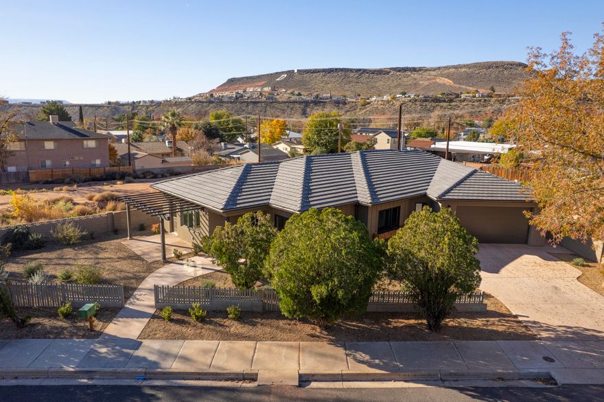 This beautiful, brand new home is situated on a 1/5th acre lot  in the heart of the vibrant city of St. George with easy access to all services, including dining, entertainment, retail and healthcare.  The home has 2,634 square feet with 3 bedrooms and 3 bathrooms, including an ADU unit that is ideal for a mother-in-law suite; a rental property; or a private space for adult children.  2 fully equipped kitchens (refrigerators, dishwashers, ranges, sinks) and 2 laundry rooms make this the ideal home for extended families or to collect rental income to help defray a monthly mortgage payment.  Luxury vinyl plank flooring throughout, granite countertops, lots of natural light, generous closets and storage spaces,  2 car garage and small fenced in yard perfect for family. Come see 313 for yourself.  Enjoy city living at its finest.