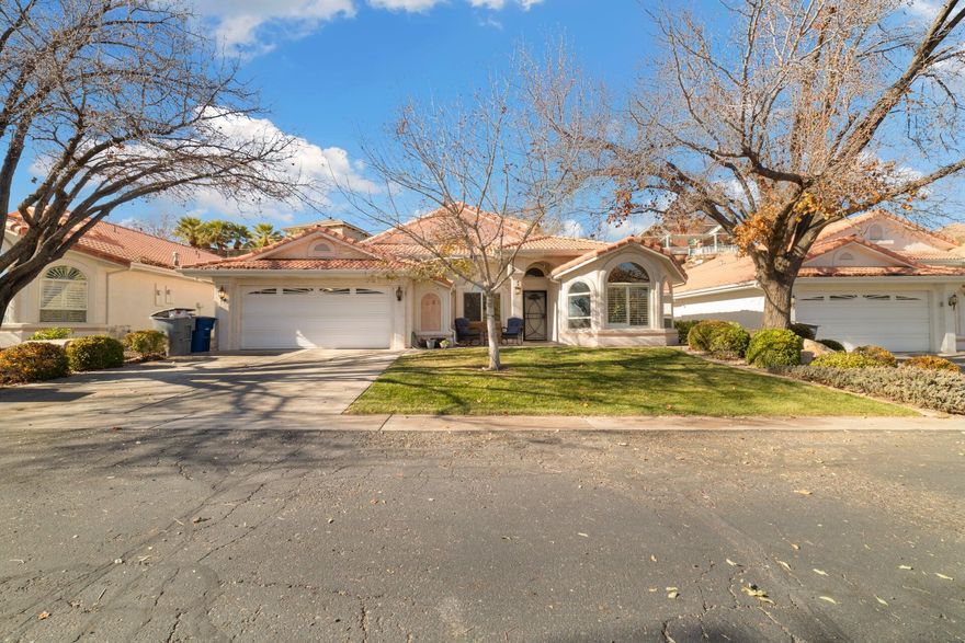 Charming three bedroom, two bath home nestled in the desirable Bloomington Hills Community, offering fantastic views of St. George Golf Course and duck pond. The open layout is filled with natural light and features a spacious living room with vaulted ceilings and cozy fireplace. The kitchen is designed for both style and function with granite countertops and ample cabinetry. Recent updates include a new Ac/heating unit and water heater. Ideally located near parks, schools and shopping.