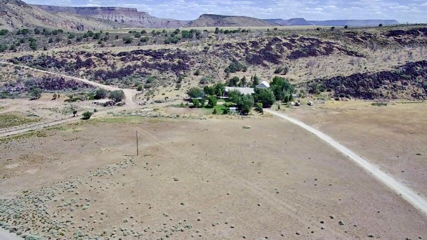 Developer's dream property!!  With 36.54 acres of land primed for development.  Think of all the homes you can build.  Not too far from the Toquerville exit.  Close to the future Toquerville reservoir. Don't forget to bring your boat. The property has an existing home with a massive 4-car garage, and a detached shop/ garage.  The detached garage/shop has a studio apartment above it as well.  The garage can fit a huge RV in it. The lot has an irrigation setup.  It comes with 20 acre feet of irrigation water. The property also has the only access to the top of the hill/plateau for prime views for a home. On top, there are about 16.54 acres of the 36.54 acres.  Water Write Number 81-3179. The City of Toquerville is planning to put a road in as well which could benefit developers further.