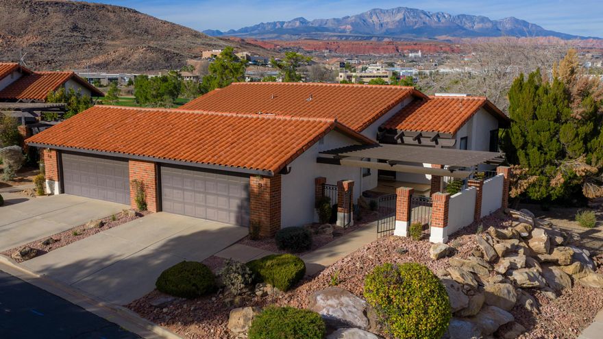 Golf and the coveted Pine Valley Mountain Views This is a STEAL for location and views.
Remodeled end-unit townhome overlooking Southgate Golf Course with sweeping fairway and mountain views. Enjoy peaceful mornings under your new pergola and stunning Southern Utah sunsets from your private vantage point. With 3 bedrooms, 3 bathrooms, 1,962 sq ft, and a 2-car garage, this home offers space, light, and privacy.
$20K invested in a new roof and pergola adds lasting value. Ideally located close to the all abilities park and nature center (Tonaquint Park), downtown St. George, dining, shopping, and medical, with quick freeway access--without the noise. Whether you're looking for comfortable full-time living or the low-maintenance getaway you've been dreaming about, this property delivers location, lifestyle, and views all in one.