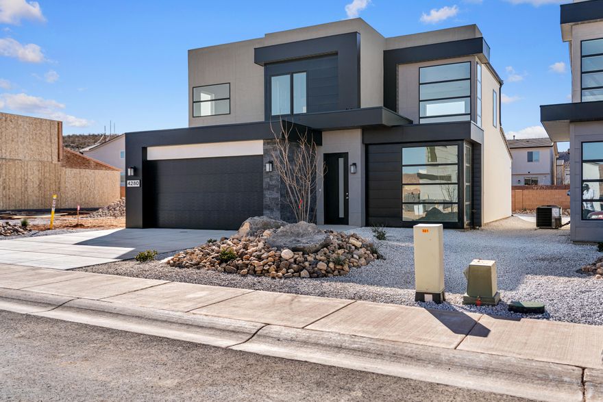 Spacious 3-car garage home featuring 4 bedrooms with the primary suite on the main level and 2.5 bathrooms, located in the brand-new Desert Reflection community by Salisbury Homes. The open layout includes EVP flooring in the main living areas and bathrooms, upgraded carpet in bedrooms, quartz countertops throughout, modern cabinetry, a stylish kitchen backsplash, and stainless steel gas appliances (fridge not included). Enjoy nearby community parks, trails, and amenities. Take advantage of a $7,000 lender incentive toward a lower interest rate. Interior and exterior finishes are predetermined and subject to change; photos are examples only. Buyer and agent to verify all information.